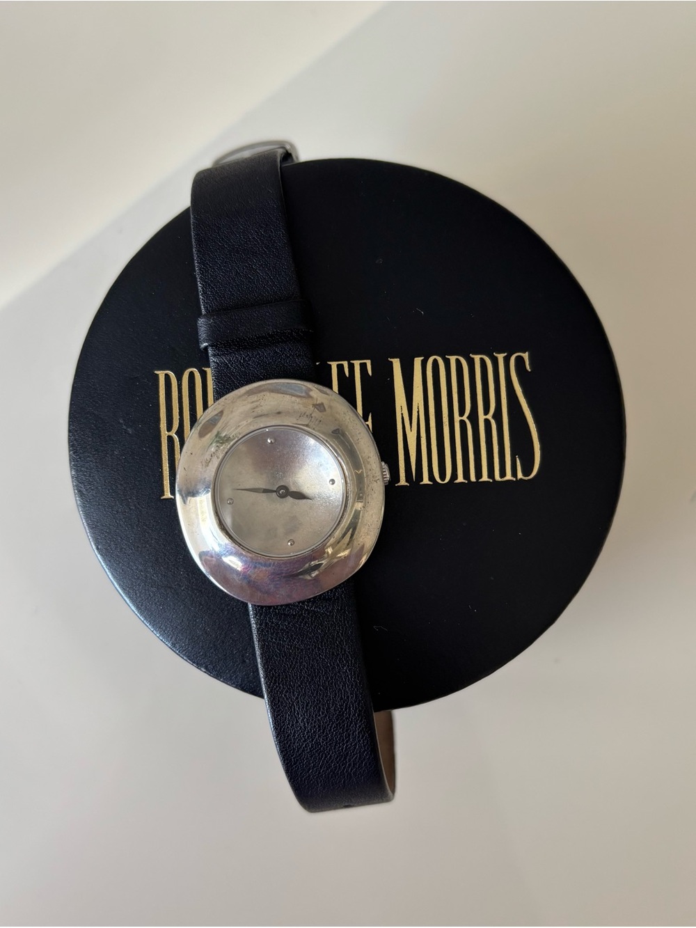 Vintage Robert Lee Morris Black Leather Watch with Silver Disc Face